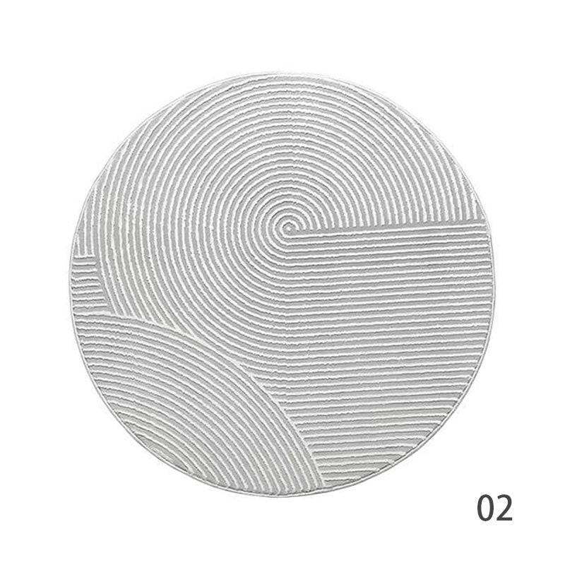 Perfect for a monochrome room. Stylish grey Wilton woven rug (HALFHALF) 