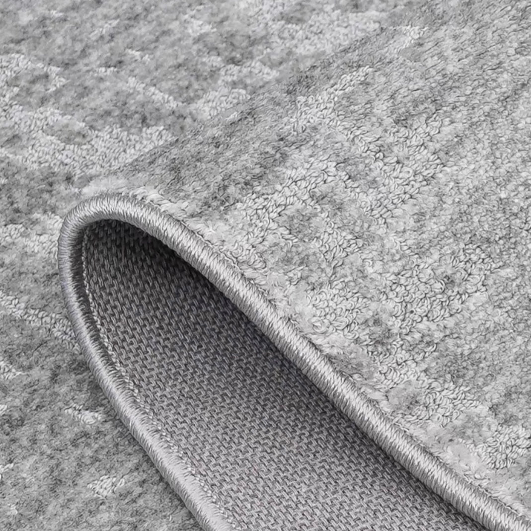 Perfect for a monochrome room. Stylish grey Wilton woven rug (Keladi)